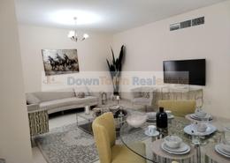 Living / Dining Room image for: Apartment - 2 bedrooms - 2 bathrooms for sale in Al Ameera Village - Ajman, Image 1