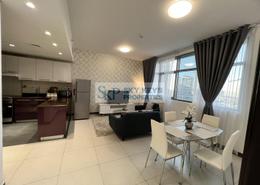 Living / Dining Room image for: Apartment - 1 bedroom - 2 bathrooms for rent in Capital Centre - Abu Dhabi, Image 1