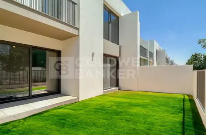 Garden image for: Villa - 3 Bedrooms - 3 Bathrooms for sale in Elan - Tilal Al Ghaf - Dubai, Image 1