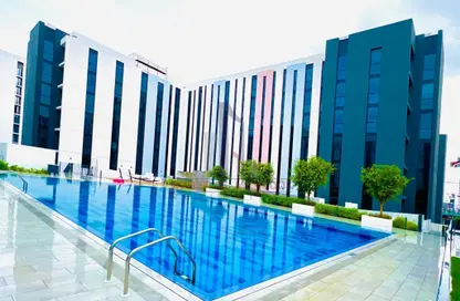 Pool image for: Apartment - 1 Bathroom for rent in East Village - Aljada - Sharjah, Image 1