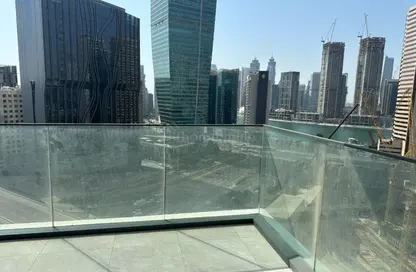 Apartment - 1 Bedroom - 2 Bathrooms for sale in The Paragon by IGO - Business Bay - Dubai