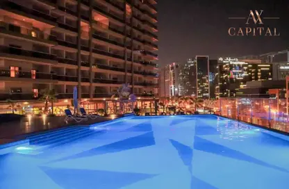 صورة لـ حوض سباحة شقة - غرفة نوم - 2 حمامات للبيع في برج ايليت ريزيدينس - دبي وسط المدينة - دبي ، صورة رقم 1