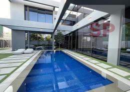 Pool image for: Villa - 6 bedrooms - 8 bathrooms for sale in Sequoia - Masaar - Tilal City - Sharjah, Image 1