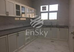 Kitchen image for: Apartment - 3 bedrooms - 3 bathrooms for rent in Al Shahama - Abu Dhabi, Image 1