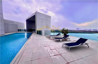 صورة لـ حوض سباحة شقة - غرفة نوم - 2 حمامات للايجار في ابراج ار دي كاي - نجمة أبوظبي - جزيرة الريم - أبوظبي ، صورة رقم 1