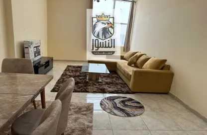 Living / Dining Room image for: Apartment - 1 Bedroom - 2 Bathrooms for rent in Ajman Twins - Al Nuaimiya - Ajman, Image 1