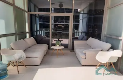 Living Room image for: Apartment - 1 Bathroom for sale in Golf Vista 1 - Golf Vista - DAMAC Hills - Dubai, Image 1