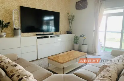 Living Room image for: Apartment - 2 Bedrooms - 3 Bathrooms for sale in Glitz 2 - Glitz - Dubai Studio City - Dubai, Image 1