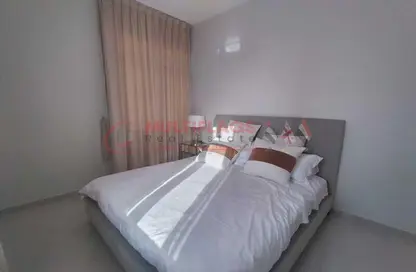 Room / Bedroom image for: Apartment - 2 Bedrooms - 2 Bathrooms for sale in Golf Tower - Emirates City - Ajman, Image 1