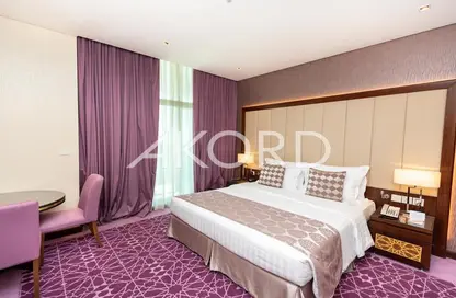 Apartment - 1 Bathroom for rent in Royal Continental Suites - Business Bay - Dubai