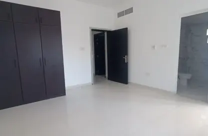 شقة - غرفة نوم - 2 حمامات للايجار في مبنى جيباس 3 - الراشدية 2 - الراشدية - عجمان