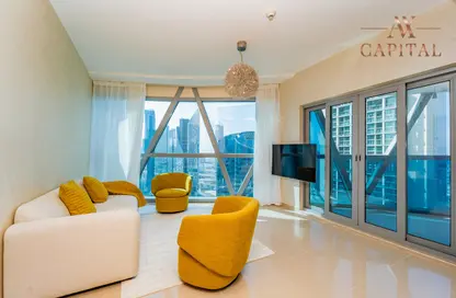 Living Room image for: Apartment - 2 Bedrooms - 3 Bathrooms for sale in Park Tower B - Park Towers - DIFC - Dubai, Image 1
