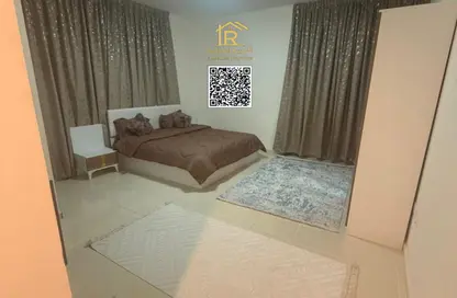شقة - غرفة نوم - 2 حمامات للايجار في أورينت تاور 1 - أورينت تاور - البستان - عجمان