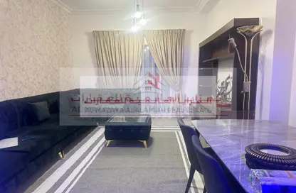 شقة - 2 غرف نوم - 2 حمامات للايجار في برج منازل 2 - شارع التعاون - التعاون - الشارقة
