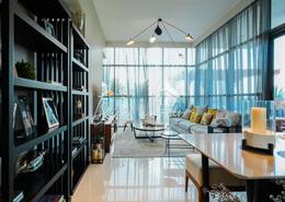 Living / Dining Room image for: Duplex - 3 bedrooms - 5 bathrooms for sale in Golf Promenade 4A - Golf Promenade - DAMAC Hills - Dubai, Image 1