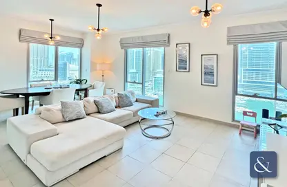 Living / Dining Room image for: Apartment - 2 Bedrooms - 3 Bathrooms for sale in Beauport Tower - Marina Promenade - Dubai Marina - Dubai, Image 1