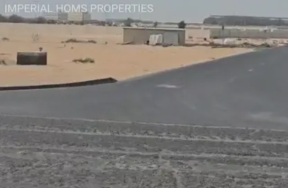 أرض - استوديو للبيع في روضة القرط - ضاحية الروضات - الشارقة