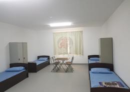 صورةغرفة- غرفة النوم لـ: سكن عمال - 1 حمام للكراء في م -17 - مصفح الصناعية - مصفح - أبوظبي, صورة 1