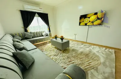 Living Room image for: Apartment - 1 Bedroom - 2 Bathrooms for rent in Al Rawda 2 Villas - Al Rawda 2 - Al Rawda - Ajman, Image 1