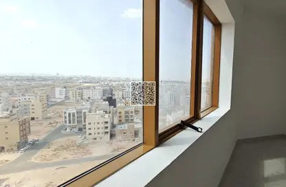 Apartment - 1 Bedroom - 2 Bathrooms for sale in Al Ghoroub Tower - Al Alia - Ajman