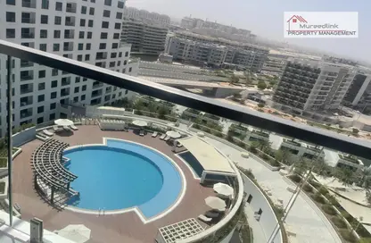 صورة لـ حوض سباحة شقة - غرفة نوم - 2 حمامات للايجار في الفريدة - شاطئ الراحة - أبوظبي ، صورة رقم 1