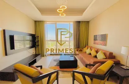 Living Room image for: Apartment - 1 Bedroom - 2 Bathrooms for rent in Al Jowhara Tower - Corniche Road - Abu Dhabi, Image 1