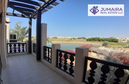 Balcony image for: Villa - 4 Bedrooms - 6 Bathrooms for sale in Al Hamra Village Villas - Al Hamra Village - Ras Al Khaimah, Image 1