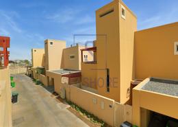 Outdoor Building image for: Townhouse - 4 bedrooms - 5 bathrooms for rent in Khannour Community - Al Raha Gardens - Abu Dhabi, Image 1