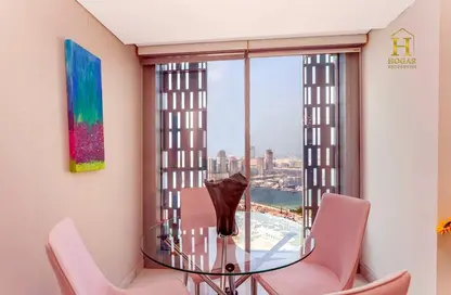 Dining Room image for: Apartment - 2 Bedrooms - 2 Bathrooms for rent in Cayan Tower - Dubai Marina - Dubai, Image 1