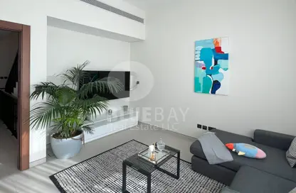 Living Room image for: Apartment - 1 Bedroom - 1 Bathroom for rent in 180 Degrees Villas - Liwan - Dubai Land - Dubai, Image 1