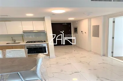 Kitchen image for: Apartment - 1 Bedroom - 2 Bathrooms for sale in Al Raha Lofts - Al Raha Beach - Abu Dhabi, Image 1
