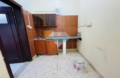 Apartment - Studio - 1 Bathroom for rent in Al Karamah - Abu Dhabi