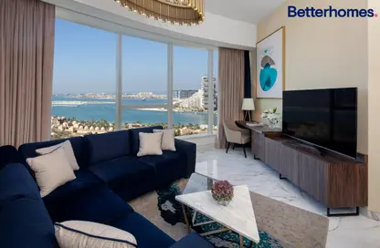 Living Room image for: Apartment - 2 Bedrooms - 3 Bathrooms for rent in Avani Palm View Hotel  and  Suites - Dubai Media City - Dubai, Image 1