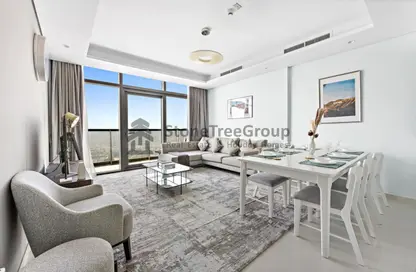 Living / Dining Room image for: Apartment - 2 Bedrooms - 2 Bathrooms for rent in Paramount Tower Hotel  and  Residences - Business Bay - Dubai, Image 1