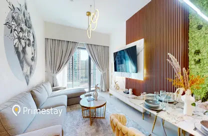 Living / Dining Room image for: Apartment - 1 Bedroom - 1 Bathroom for rent in Burj Royale - Downtown Dubai - Dubai, Image 1