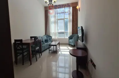 Living / Dining Room image for: Apartment - 1 Bedroom - 2 Bathrooms for rent in Al Nahyan - Abu Dhabi, Image 1