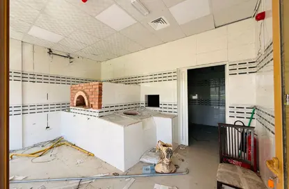Shop - Studio - 1 Bathroom for rent in Spain Cluster - International City - Dubai