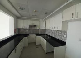 Kitchen image for: Apartment - 1 bedroom - 2 bathrooms for rent in Waterfall District - Al Ghadeer - Abu Dhabi, Image 1