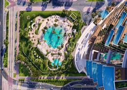 Pool image for: Apartment - 4 bedrooms - 5 bathrooms for sale in Cavalli Casa Tower - Dubai Marina - Dubai, Image 1