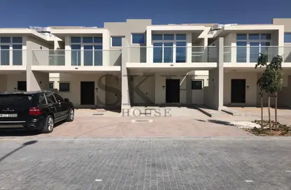 Outdoor Building image for: Townhouse - 3 Bedrooms - 3 Bathrooms for sale in Basswood - Damac Hills 2 - Dubai, Image 1