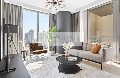 Living Room image for: Apartment - 1 Bedroom - 2 Bathrooms for sale in Boulevard Point - Downtown Dubai - Dubai, Image 1