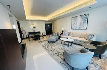 Living / Dining Room image for: Apartment - 1 Bedroom - 2 Bathrooms for rent in Burj Lake Hotel - The Address DownTown - Downtown Dubai - Dubai, Image 1