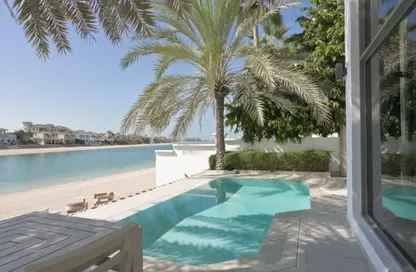 Pool image for: Villa - 4 Bedrooms - 5 Bathrooms for sale in Garden Homes Frond K - Garden Homes - Palm Jumeirah - Dubai, Image 1