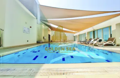 صورة لـ حوض سباحة شقة - غرفة نوم - 2 حمامات للايجار في الدانة - شاطئ الراحة - أبوظبي ، صورة رقم 1