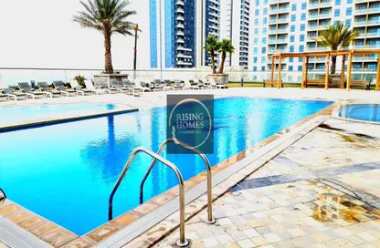 صورة لـ حوض سباحة شقة - 2 غرف نوم - 3 حمامات للايجار في برج سي سايد - شمس أبوظبي - جزيرة الريم - أبوظبي ، صورة رقم 1