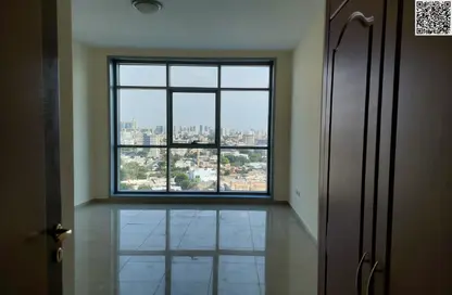 Apartment - 1 Bedroom - 2 Bathrooms for sale in Corniche Tower - Ajman Corniche Road - Ajman