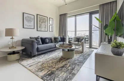 Living Room image for: Apartment - 2 Bedrooms - 2 Bathrooms for sale in Burj Royale - Downtown Dubai - Dubai, Image 1