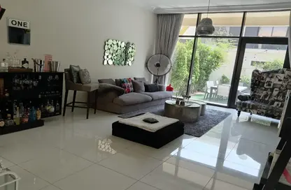 Living Room image for: Villa - 4 Bedrooms - 5 Bathrooms for sale in Brookfield 1 - Brookfield - DAMAC Hills - Dubai, Image 1