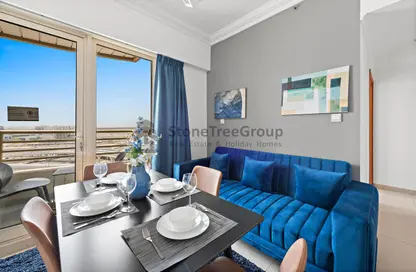 Living / Dining Room image for: Apartment - 1 Bedroom - 1 Bathroom for rent in Manchester Tower - Dubai Marina - Dubai, Image 1
