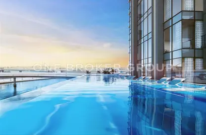 صورة لـ حوض سباحة شقة - غرفة نوم - 2 حمامات للبيع في واحة اوربان - الخليج التجاري - دبي ، صورة رقم 1